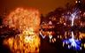 Copenhagen: The beautiful Tivoli Lake is lit up at Christmas by the surrounding trees. 
Photographer: Morten Jerichau. 
For terms of use please visit http://www.copenhagenmediacenter.com/